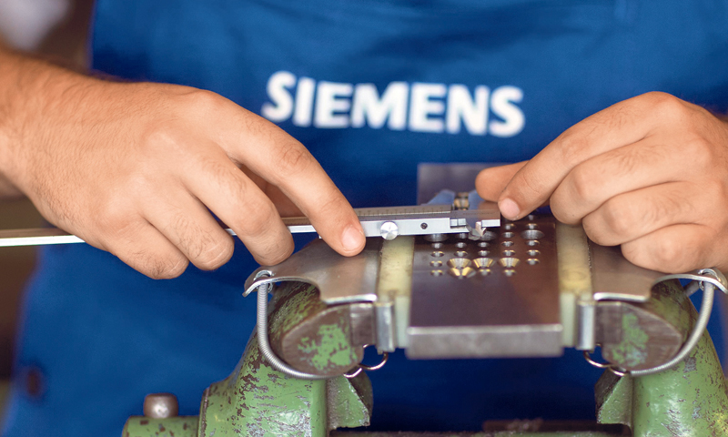 Siemens će otpustiti oko četiri posto radne snage/REUTERS