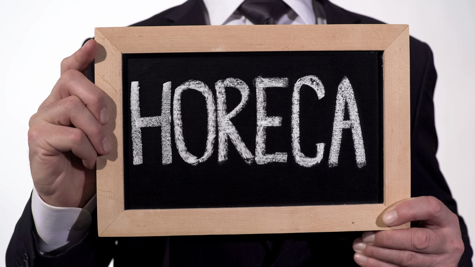 Horeca,Written,On,Blackboard,In,Businessman,Hands,,Catering,Service,Industry,