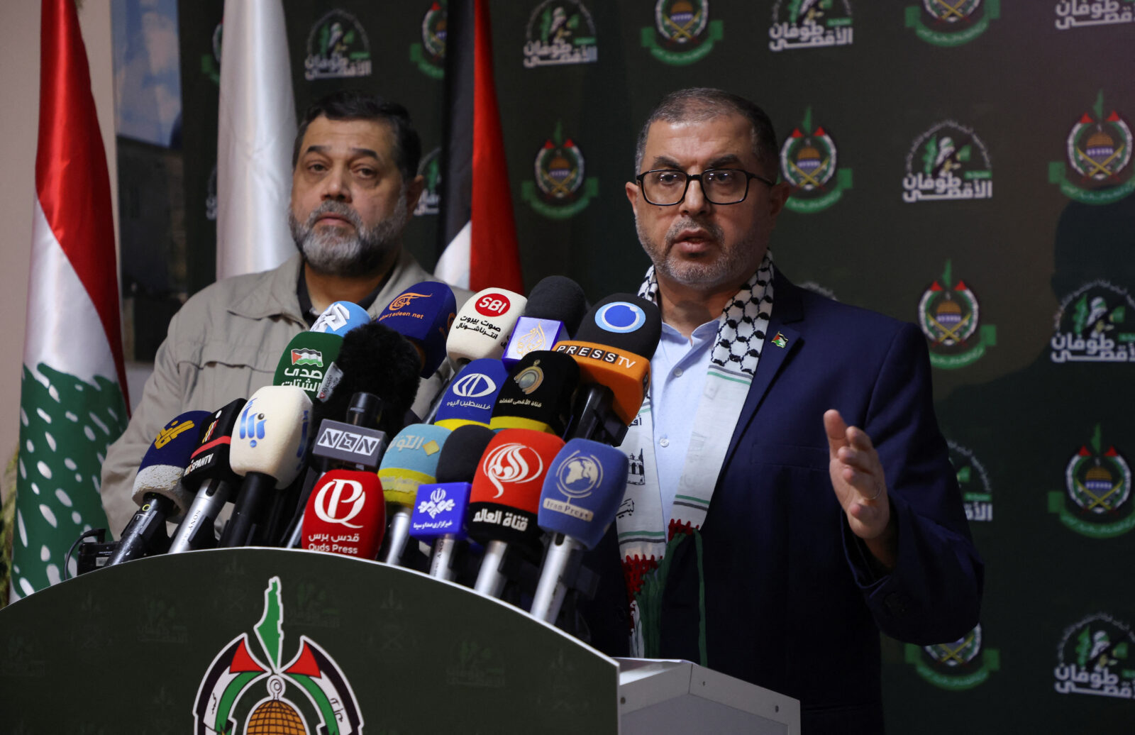 Hamas officials Osama Hamdan and Bassem Naim attend a joint news conference in Beirut