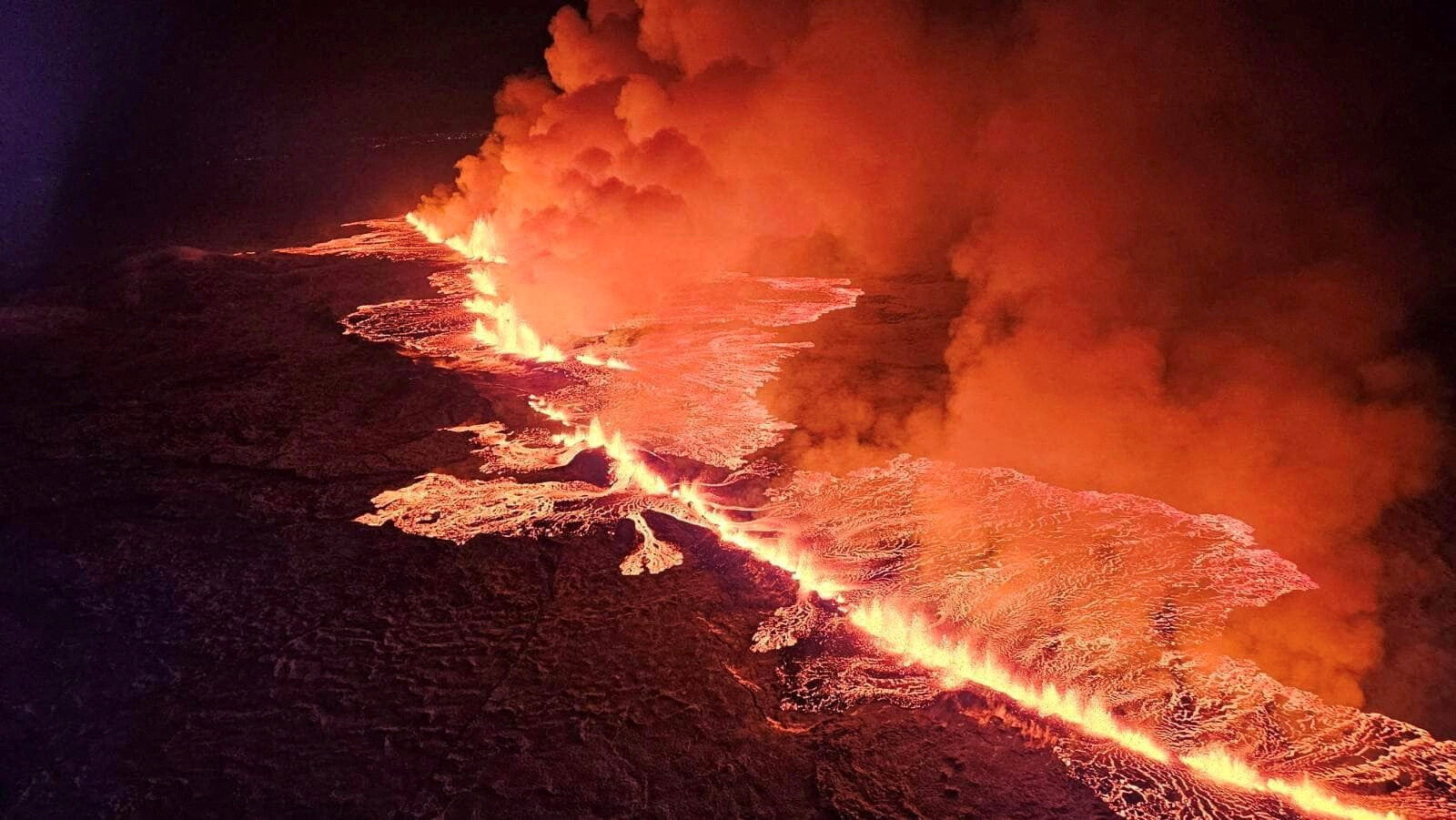 A volcano spews lava and smoke as it erupts in Grindavik