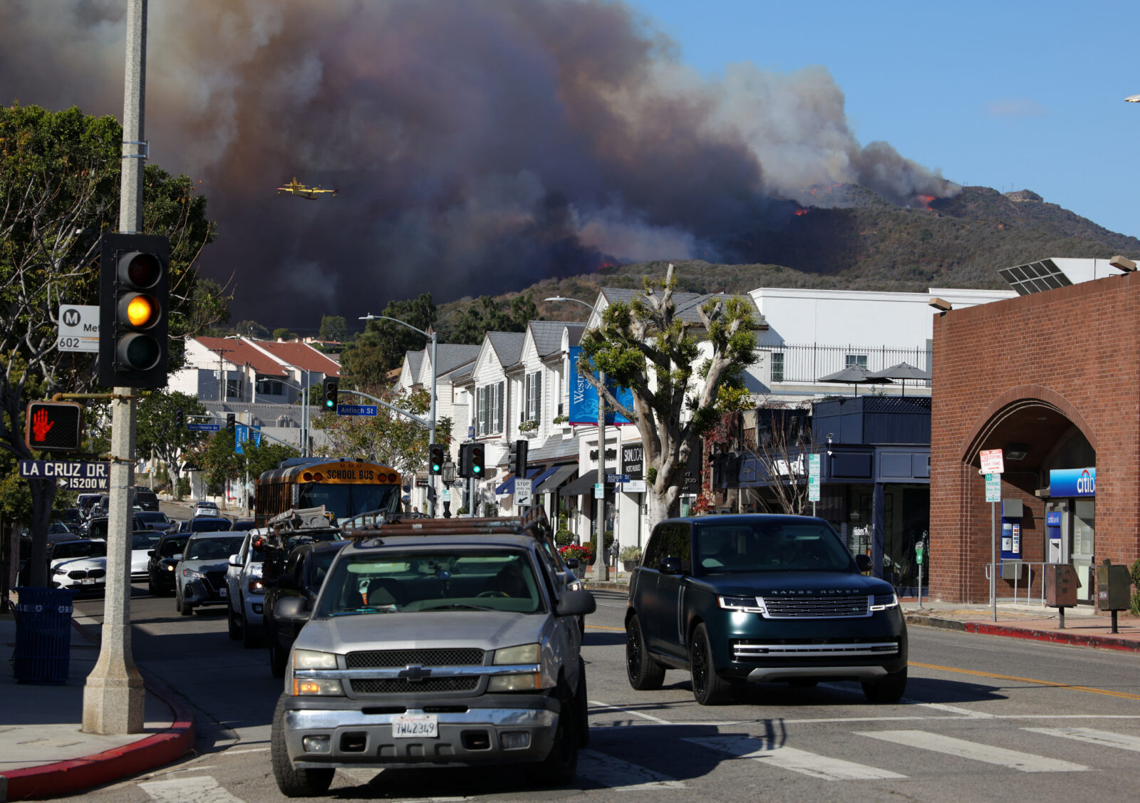 A wildfire burns near Pacific Palisades on the west side of Los Angeles